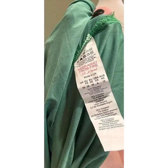 Pretty Little Things green NWT 6 Slinky cut out lace up bell sleeve body con dre - Picture 7 of 7